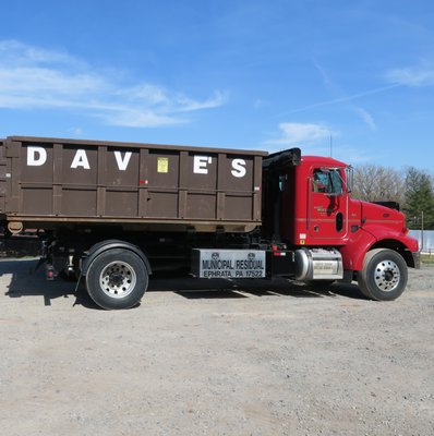 Truck with a 15 yd. dumpster