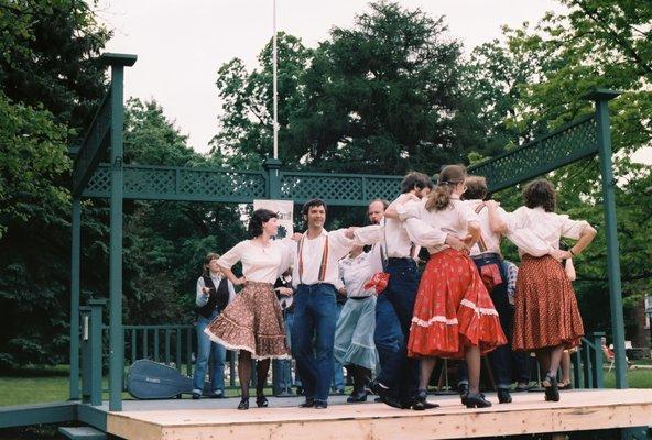 It is traditional for one of the dancers to be the "caller." You can see Bill Kreamer at center calling the next step.