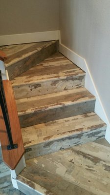 Reclaimed barn board look alike and stair nose. Northwest Arkansas remodeling contractor Leeroy Crossland.