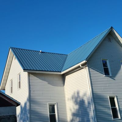 Exposed fastener steel roof in ocean blue