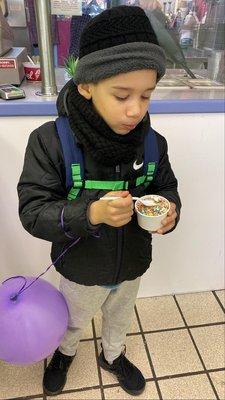 Grandson enjoying his ice cream