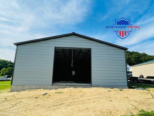 FINISHED PRODUCT 30'W X 50'L X 10'H VERTICAL ROOF GARAGE ( FRONT VIEW )