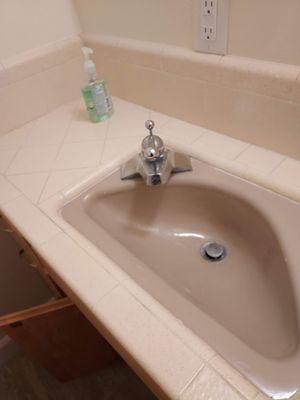 Bathroom 1 sink and counter before.