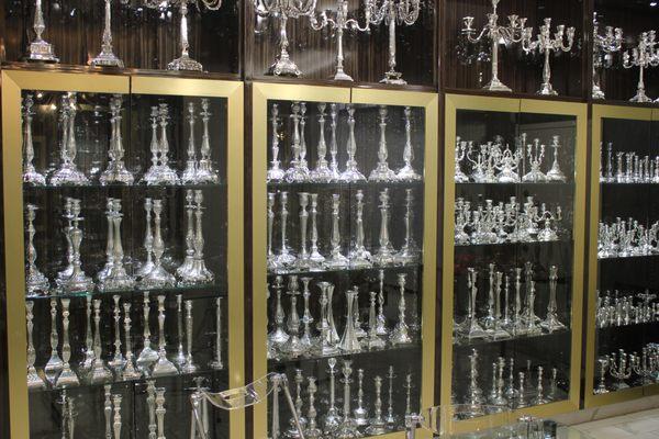 Large selection of candlesticks and oil sticks