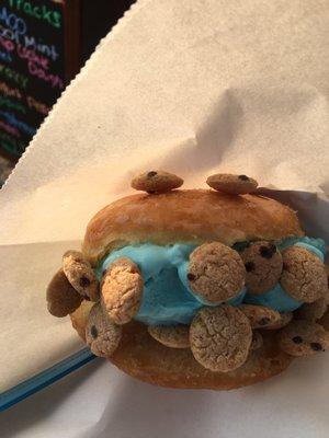 Doughnut Filled with blue moon ice cream and covered with Cookie Crisp cereal! It looks like the Cookie Monster!