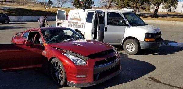 Installing a new windshield on a Nissan GTR