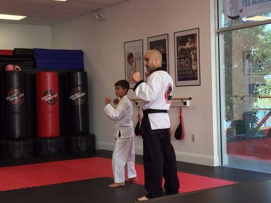 Sensei Garcia teaching private lessons to a student.