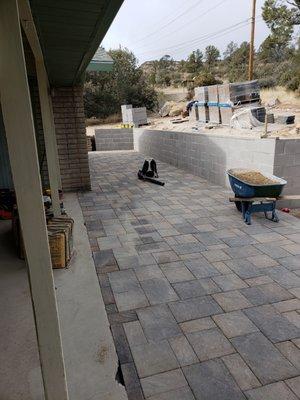 Block retaining wall and paver install