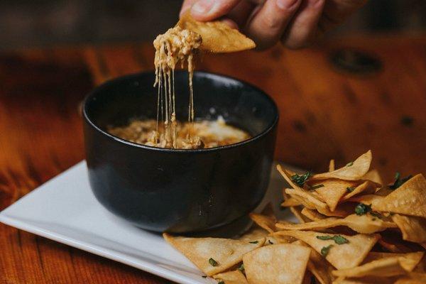 Queso dip with chips or fries $12
Monterey Jack, Oaxaca cheese, parmigiana cheese