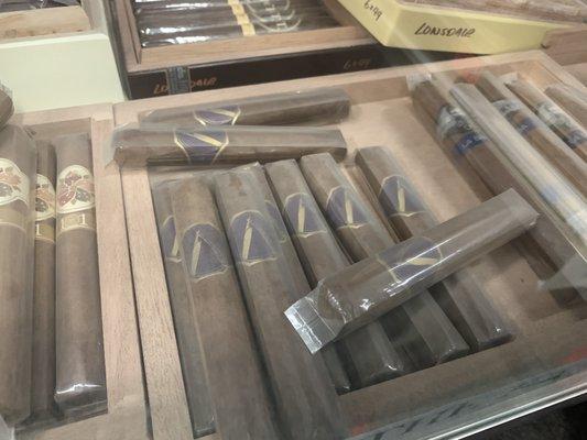 Cigars should not be handled and tossed around. What's up with this place?