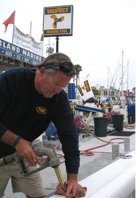 Michael Fowlkes, executive producer of Fox Sports Inside Sportfishing, filling up with ValvTect at Island Marine Fuel, Balboa Is