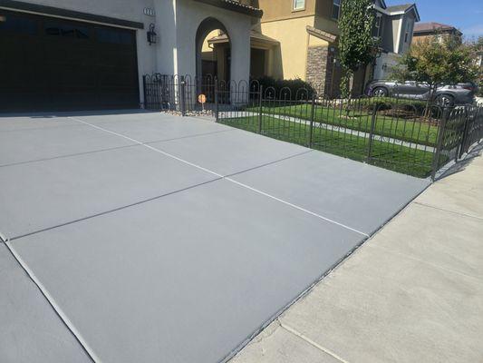 The concrete exterior floor painted two coats with Heavy Sheild.