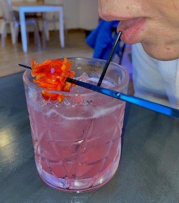 Martha about to sip her Hibiscus Cocktail