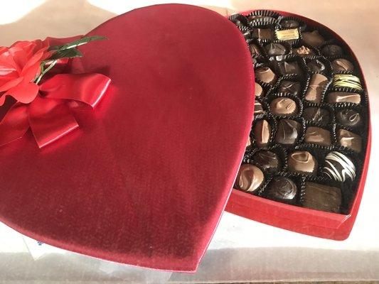 Heart box filled with Regina's chocolates.