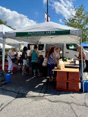 Shoppers line up. All Delicious Organic Different Varieties of Fruits & Veggies @ Hutchins Farm.  3 Farmer's Market locations & Concord.