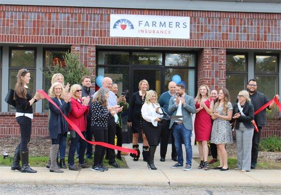 Ribbon-cutting ceremony for the Lansing location for Farmers Insurance the Sarah Schafer Agency