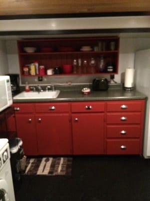 Kitchen is perfect full size stove and refrigerator also a microwave and coffee post are provided