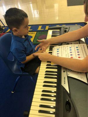 Our son loves piano time!