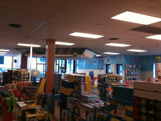 Merchandise strewn everywhere.  The mirrored part of the ceiling is where the cash registers were when this was a Blockbuster.