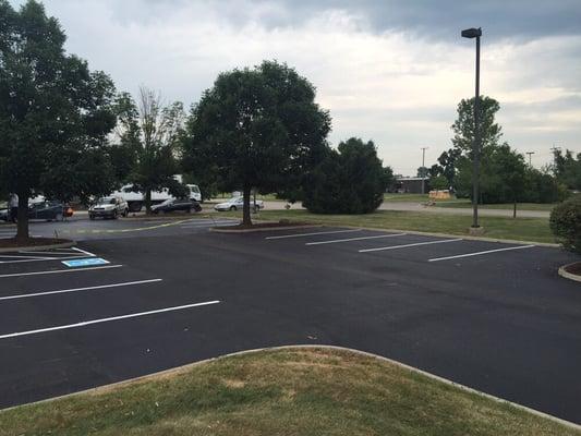 Parking lot, after being re-paved and striped.