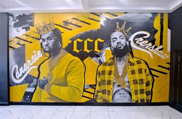 Memorial mural dedicated to Pop Smoke and Nipsey Hussle. Located at Canarsie Clothing Corner, 8923 Flatlands Ave, Brooklyn, NYC.