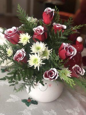 Frosted Ecuador roses and pine in a designer vase