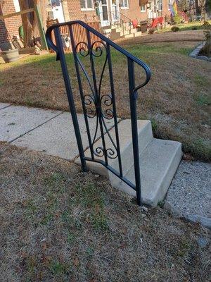 Here is the beautiful railing cemented next to the existing steps! We LOVE it!