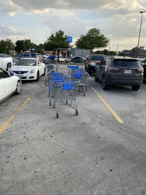 Carts left in parking lot that I was told, by Walmart employee, that I have to go retrieve if I wanted to shop.