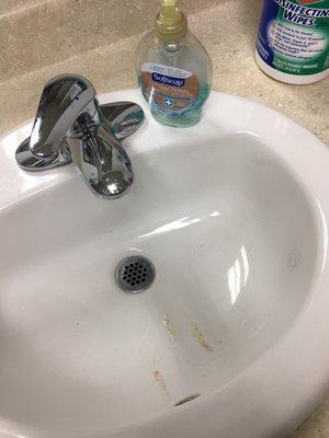 Filthy sink almost every am lack of decency wipes right there