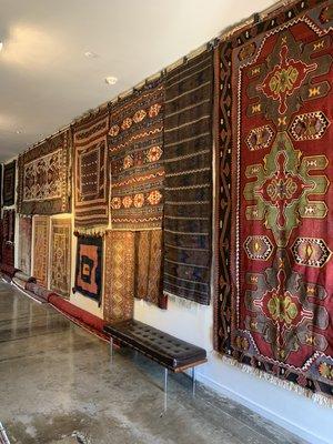 One of three walls covered in antique rugs on special exhibit until fall 2019