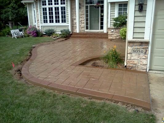 Another view of a stamped concrete sidewalk.