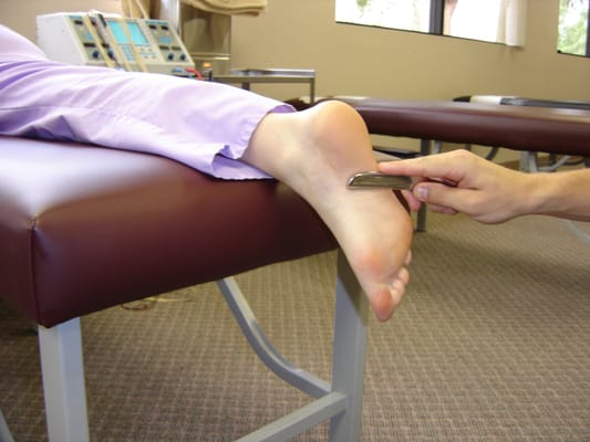 Graston Technique for breaking up scar tissue.  Plantar fasciitis, tendinitis, muscle spasms, and knots in all muscles & tendons