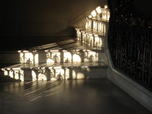 Afternoon light on the library's main staircase.