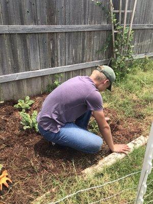 Law maintenance crew cleaning out gardens! Give us a call for referrals!