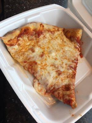 Slice of cheesy pizza