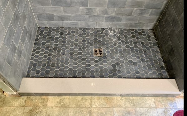 Tile shower floor.