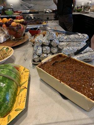 Watermelon, bbq baked beans, Tommy's street corn