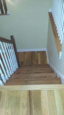 Stairs stained to match handrails wonderfully.