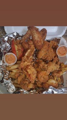 Fried Seafood Platter-King crab, shrimp, fish, and lobster tail with fries