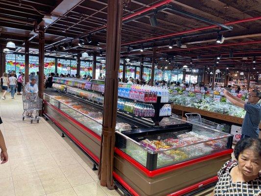 Produce area to the right and frozen food in front