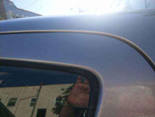 after repair: no more dent on top of door.