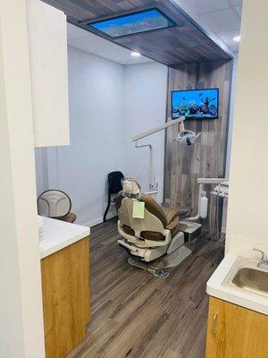 With TV's on the wall and ceiling, you can continue to watch your movie or show uninterrupted during your dental treatment!