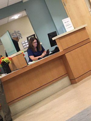 Rude lady, on her phone and talking about unnecessary things to her coworkers. Bad management and never start appointments on time.