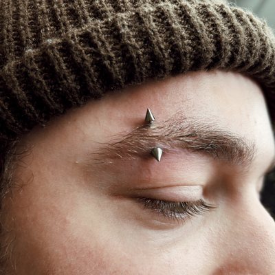 Eyebrow piercing by Maria