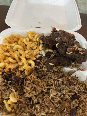 Nasty Oxtails that was dry. Extra dry rice and macaroni and cheese.