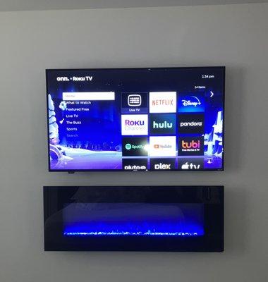 Tv mounting and floating fireplace