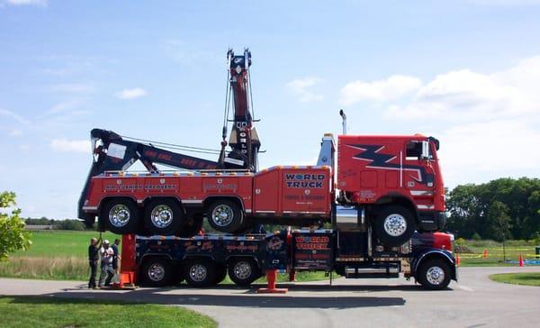 80 Ton Rotator lifting a 50 Ton tow Truck from the side.