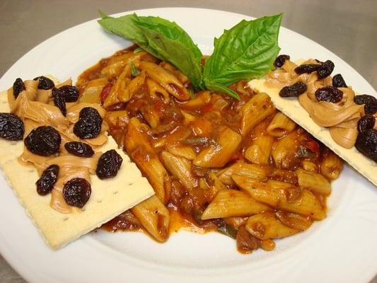 Spicy penne, Sicilian flatbread crostini with goober pea puree and sundried grapes