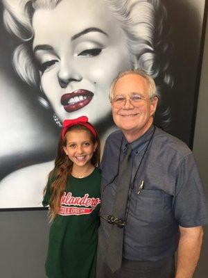 Dr. Ray McLendon the sweetest & best orthodontist ever! with my granddaughter Kayla.