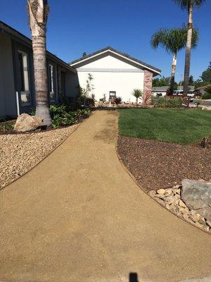 Vallarta Landscaping/ Dark spots on Decomposed granite is water.  Hadn't adjusted the sprinklers yet when I took the picture & just watered